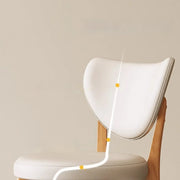 Silla de comedor sin brazos estilo wingback de piel sintética moderna