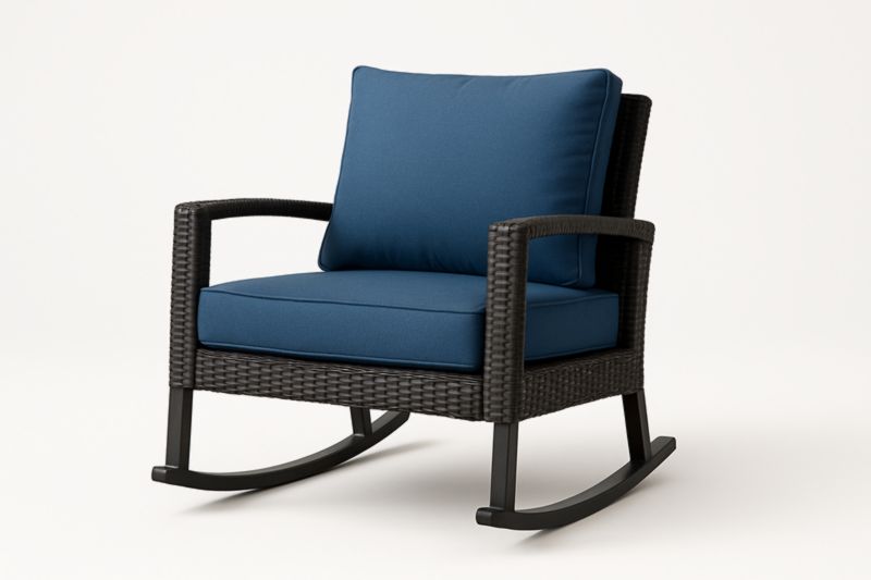 Sillón mecedora de resina trenzada marrón con cojines azules