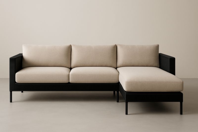 Sofá rinconero de tela beige y negro con estructura de aluminio