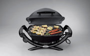 Barbacoa eléctrica Weber Q1400, superficie de cocción de 43 x 32 cm, barbacoa portátil, rejilla de cocción de hierro fundido vitrificado dividida en 2, tapa y cuerpo de aluminio fundido - Gris oscuro (52020079)