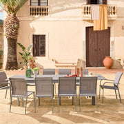 sweeek - Mesa de jardín extensible de aluminio + 10 asientos de aluminio y textileno antracita. 8 sillas. 2 sillones. 10 plazas. 290 x 100 x 75 cm