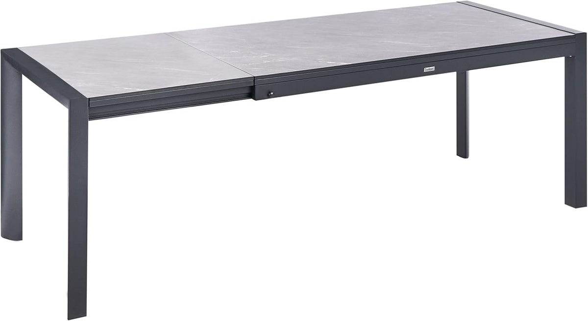 Mesa de jardín Beliani HPL efecto piedra gris rectangular 160/220x90 cm extensible con estructura de metal negra Binasco