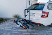 Portabicicletas de enganche Fischer ProlineEvo 2, para 2 bicicletas hasta 60 kg de carga útil, apto para bicicletas eléctricas, premontado, bloqueable, plegable