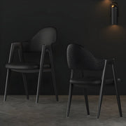 Silla de comedor con reposabrazos de cuero moderna curvada de respaldo abierto
