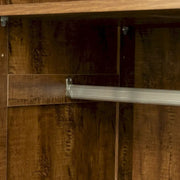 Armario de madera blanca con puertas, cajones y barra para colgar