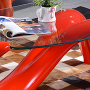 Mesa de centro abstracta moderna con base de metal y cubierta de cristal ovalada