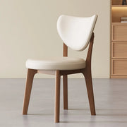 Silla de comedor sin brazos estilo wingback de piel sintética moderna