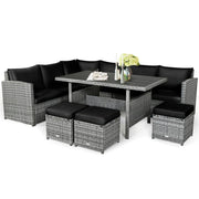 Conjunto de muebles de comedor para patio de 7 piezas de ratán con sofá seccional, mesa de comedor, otomanas y cojines