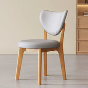 Silla de comedor sin brazos estilo wingback de piel sintética moderna