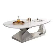 Mesa de centro con superficie de cerámica y base contemporánea de acero inoxidable, una pieza elegante y duradera para la sala de estar.