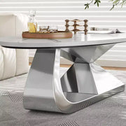 Mesa de centro con superficie de cerámica y base contemporánea de acero inoxidable, una pieza elegante y duradera para la sala de estar.
