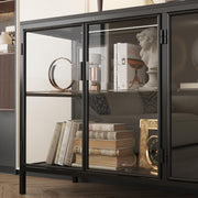 Vitrina moderna Caldion con iluminación LED, 140×40×75 cm, armario expositor de vidrio templado y MDF, hierro, vitrina de cristal con iluminación de 3 colores, para salón, oficina