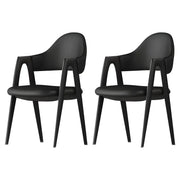 Silla de comedor con reposabrazos de cuero moderna curvada de respaldo abierto