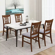 Juego de 4 sillas de comedor Costway con asiento acolchado, respaldo hueco y estructura de madera de caucho