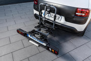 Portabicicletas de enganche Fischer ProlineEvo 2, para 2 bicicletas hasta 60 kg de carga útil, apto para bicicletas eléctricas, premontado, bloqueable, plegable