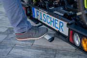 Portabicicletas de enganche Fischer ProlineEvo 2, para 2 bicicletas hasta 60 kg de carga útil, apto para bicicletas eléctricas, premontado, bloqueable, plegable