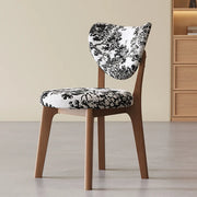 Silla de comedor sin brazos estilo wingback de piel sintética moderna