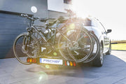 Portabicicletas de enganche Fischer ProlineEvo 2, para 2 bicicletas hasta 60 kg de carga útil, apto para bicicletas eléctricas, premontado, bloqueable, plegable