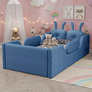Cama plataforma doble Whisen, cama de suelo tapizada para niños con cojín de conejo, barandillas laterales extraíbles
