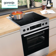 Gorenje GECS5C70XPA Cocina eléctrica independiente con placa vitrocerámica / 50 cm / 70 litros / GentleClose / Calentamiento rápido / AirFry / ExtraSteam / Modo pizza 300°C / Guías telescópicas / AquaClean / Zona paellera / negro