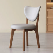 Silla de comedor sin brazos estilo wingback de piel sintética moderna