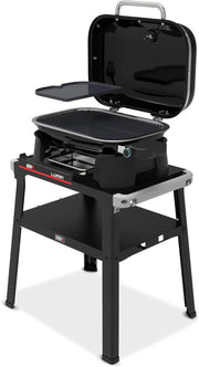 Barbacoa eléctrica Weber Lumin con soporte/Hasta 315 °C, con termómetro en la tapa, rejillas de hierro fundido vitrificado, superficie de cocción de 33 x 49 cm, negro (92010879)