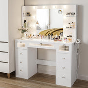 Tocador blanco con espejo iluminado de 23.5”, escritorio con cubierta de vidrio, 9 cajones, 3 colores de luces tipo Hollywood, 4 repisas, acrílico y toma de corriente, mesa de maquillaje para dormitorio