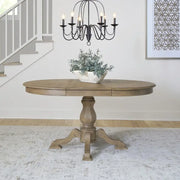 Mesa de comedor redonda de pedestal Magnolia Manor con extensiones expandibles - 2 acabados