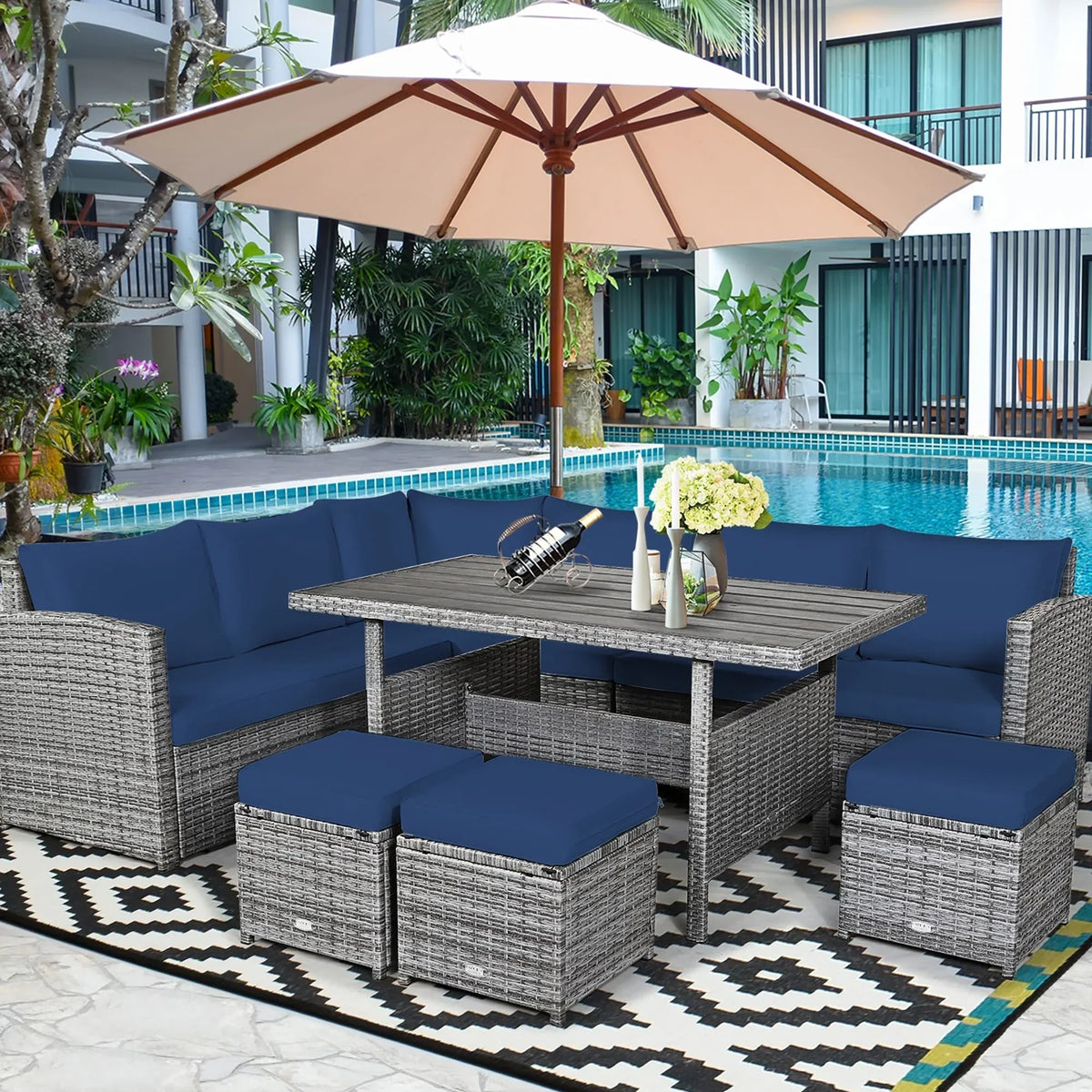 Conjunto de comedor de ratán para patio de 7 piezas Costway, sofá seccional y otomana - Ver detalles