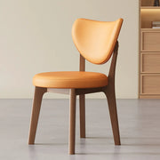 Silla de comedor sin brazos estilo wingback de piel sintética moderna