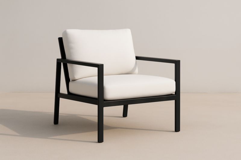 Sillón de aluminio con cojines blancos