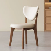 Silla de comedor sin brazos estilo wingback de piel sintética moderna
