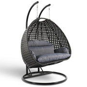 LeisureMod Silla Colgante Huevo para 2 Personas con Soporte - Columpio Hamaca Lounger de Ratán para Patio Exterior/Interior con Cojines