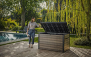 Arcón de almacenamiento Keter Signature 870L nogal - Caja de jardín con aspecto de madera y función de asiento - Baúl para cojines resistente a la intemperie con pistones de gas