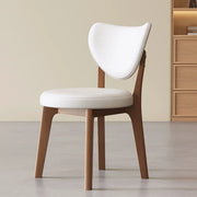 Silla de comedor sin brazos estilo wingback de piel sintética moderna