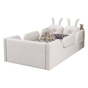 Cama plataforma doble Whisen, cama de suelo tapizada para niños con cojín de conejo, barandillas laterales extraíbles