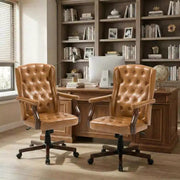 Silla de oficina ejecutiva con diseño de respaldo alado y giro para oficina en casa