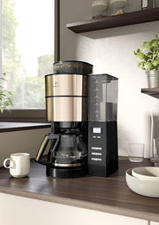 Melitta AromaFresh - Cafetera de filtro - con jarra de cristal - molinillo integrado - función de temporizador - 10 tazas - Negro puro