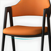 Silla de comedor con reposabrazos de cuero moderna curvada de respaldo abierto