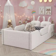 Cama plataforma doble Whisen, cama de suelo tapizada para niños con cojín de conejo, barandillas laterales extraíbles