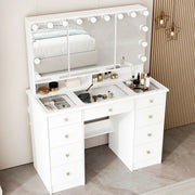 Tocador de maquillaje con espejo triple, iluminación certificada y superficie de cristal