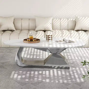 Mesa de centro con superficie de cerámica y base contemporánea de acero inoxidable, una pieza elegante y duradera para la sala de estar.