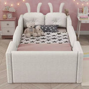 Cama plataforma doble Whisen, cama de suelo tapizada para niños con cojín de conejo, barandillas laterales extraíbles