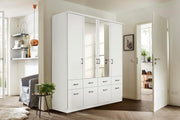 Armario de puertas batientes Rauch Möbel Bremen, armario ropero en blanco con 2 espejos y 8 cajones, 4 puertas, incluye paquete de accesorios Basic, 1 barra de armario, 4 estantes, ancho x alto x profundidad 181x199x58 cm