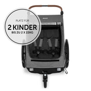 hauck Remolque de bicicleta y cochecito Dryk Duo Plus con suspensión, para 2 niños (6-48 meses), incluye barra de tiro, rueda de cochecito, bandera y luz LED, plegable, altura ajustable, maletero XL (verde oscuro)
